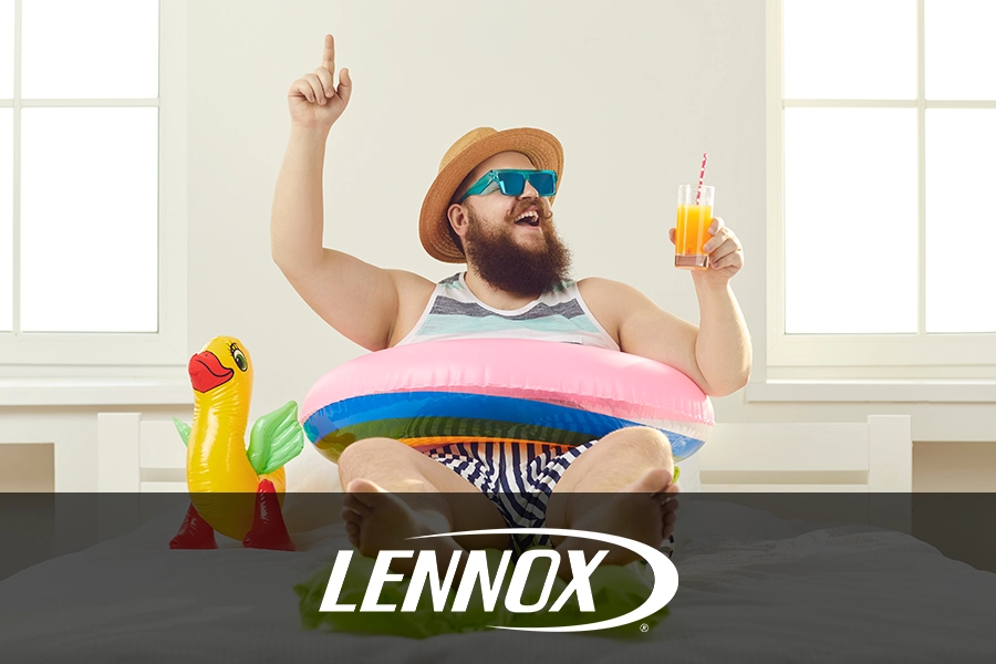 A funny man in sunglasses and a hat holding a juice glass and sitting in an inflatable tube—with his functioning AC, he's ready to stay cool this summer in Springfield, IL.)