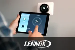 Bormida Heating & Cooling—Man adjusts the temperature using a tablet with smart home app in modern living room in Springfield, IL.