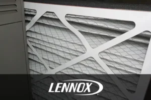 Bormida Heating & Cooling—Installing a new, clean air filter in a residential furnace at a home in Springfield, IL.