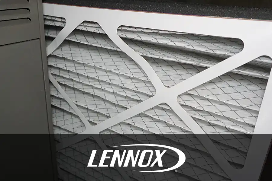 Bormida Heating & Cooling—Installing a new, clean air filter in a residential furnace at a home in Springfield, IL.