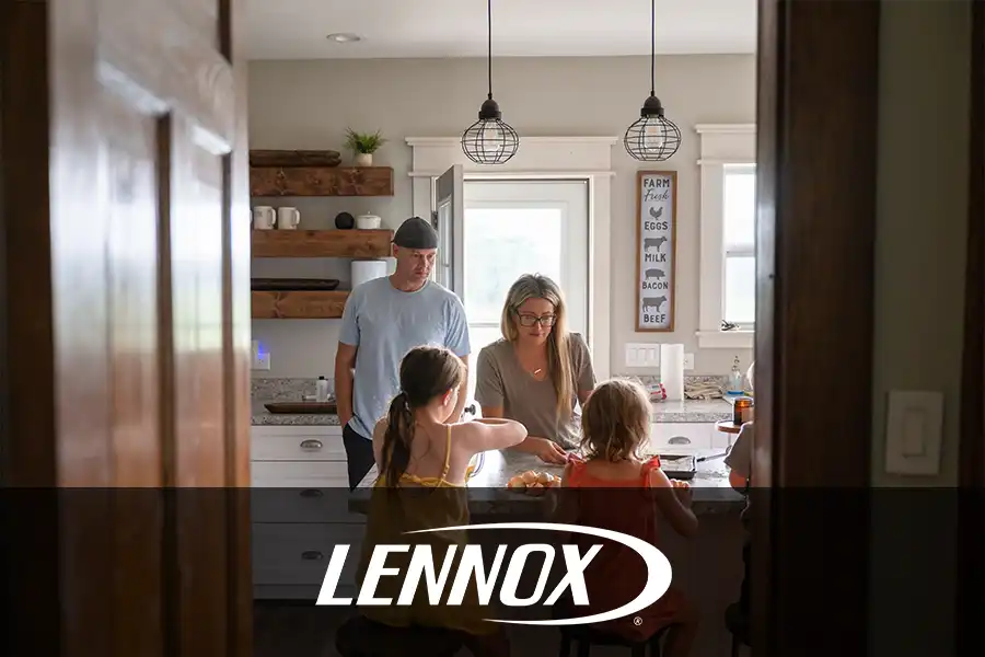 Bormida Heating & Cooling—A family sits comfortably in their kitchen thanks to their HVAC system working well in the summer months in Springfield, IL.