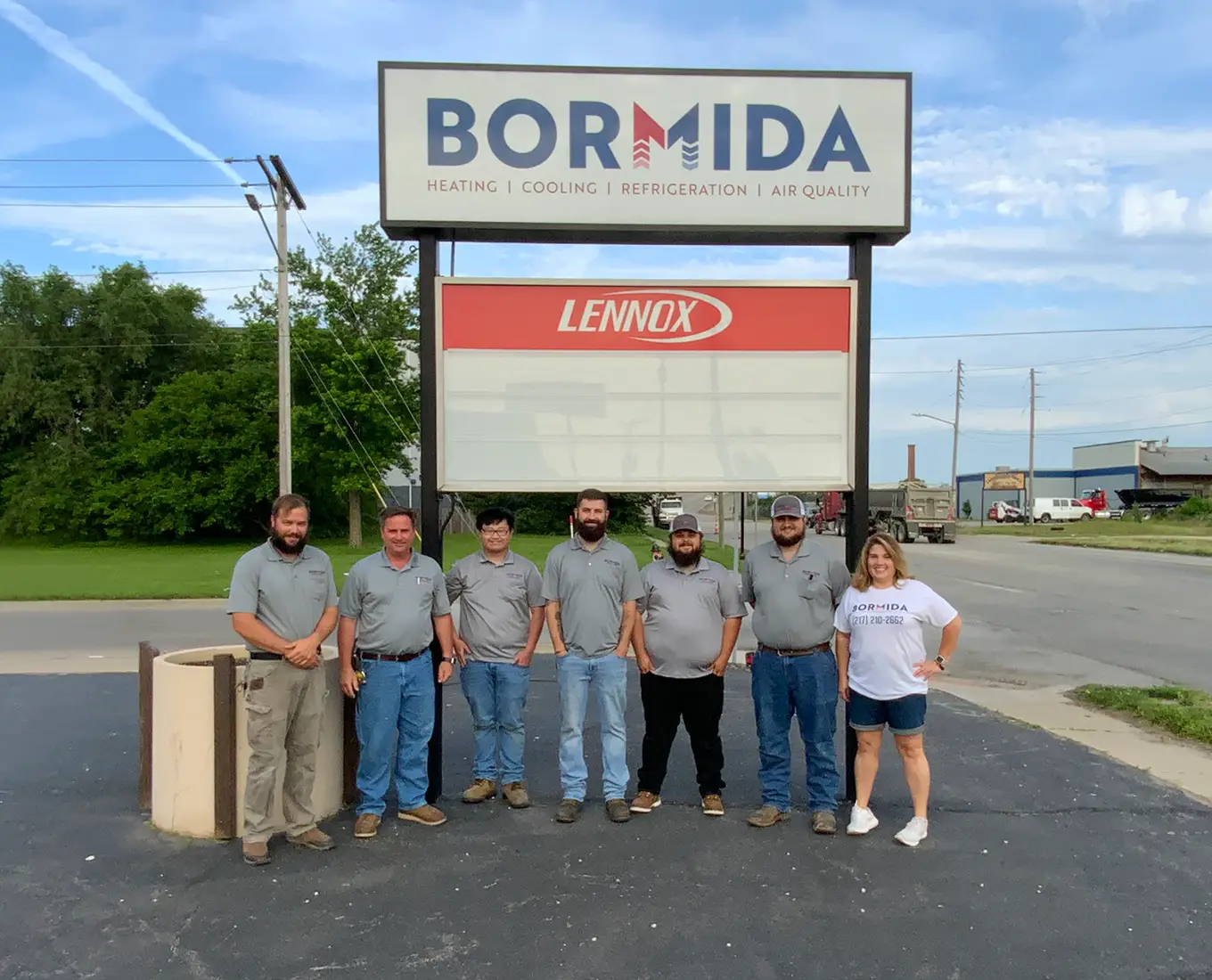 Bormida Heating & Cooling team outside their facility, assisting Jacksonville customers with HVAC installation, maintenance, and repair services.