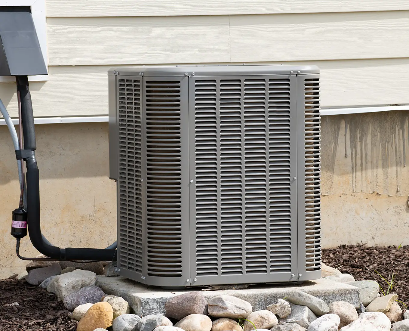 High-efficiency outdoor air conditioning unit providing dependable cooling services for homes in Springfield, IL.