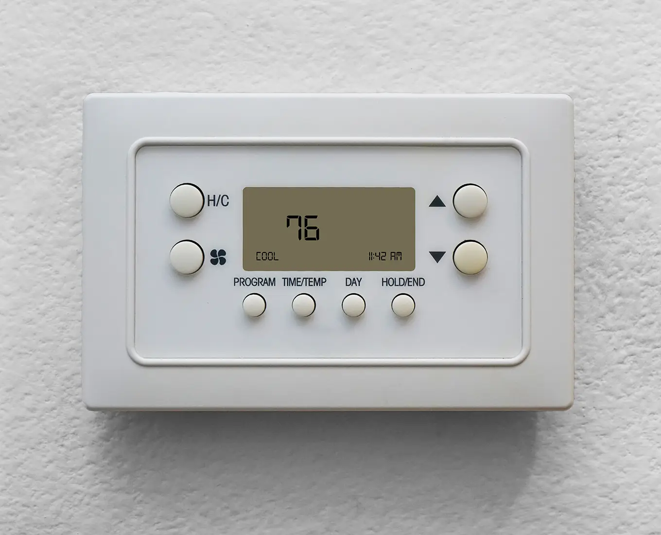 Digital thermostat set to cool mode after emergency air conditioning repair restored proper cooling in Springfield, IL.