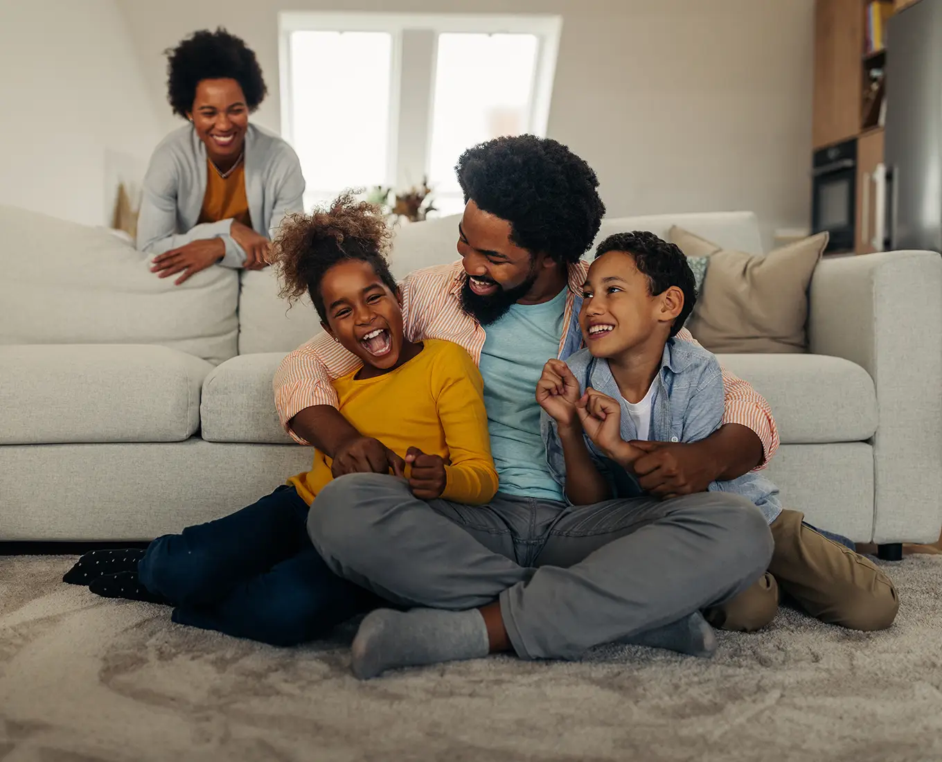 Family enjoying a warm and comfortable home thanks to furnace repair services from Bormida Heating & Cooling in Springfield, IL.