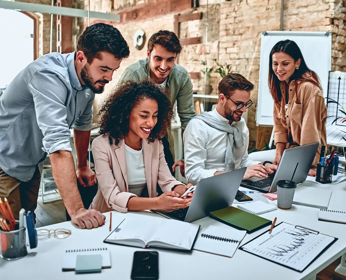 Business team collaborating in office representing commercial HVAC service support in Springfield, IL