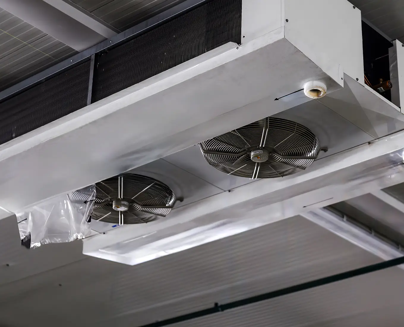 Commercial refrigeration cooling unit with industrial fans used for temperature control in Springfield, IL businesses