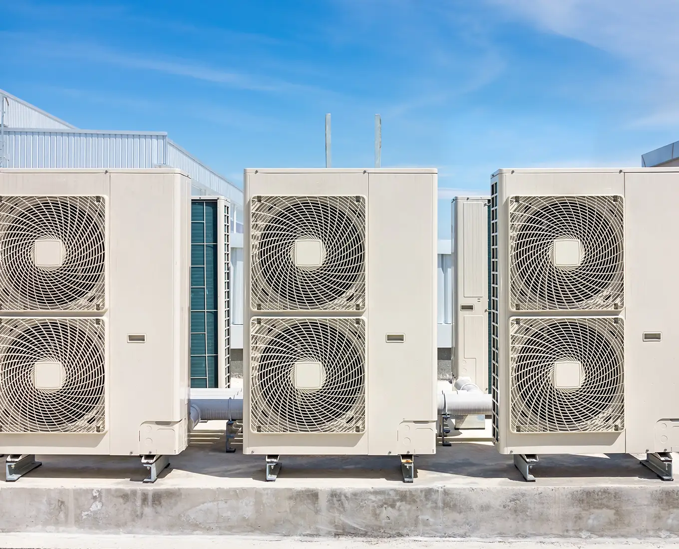 Commercial heat pump units installed on rooftop for large-scale heating and cooling systems in Springfield, IL