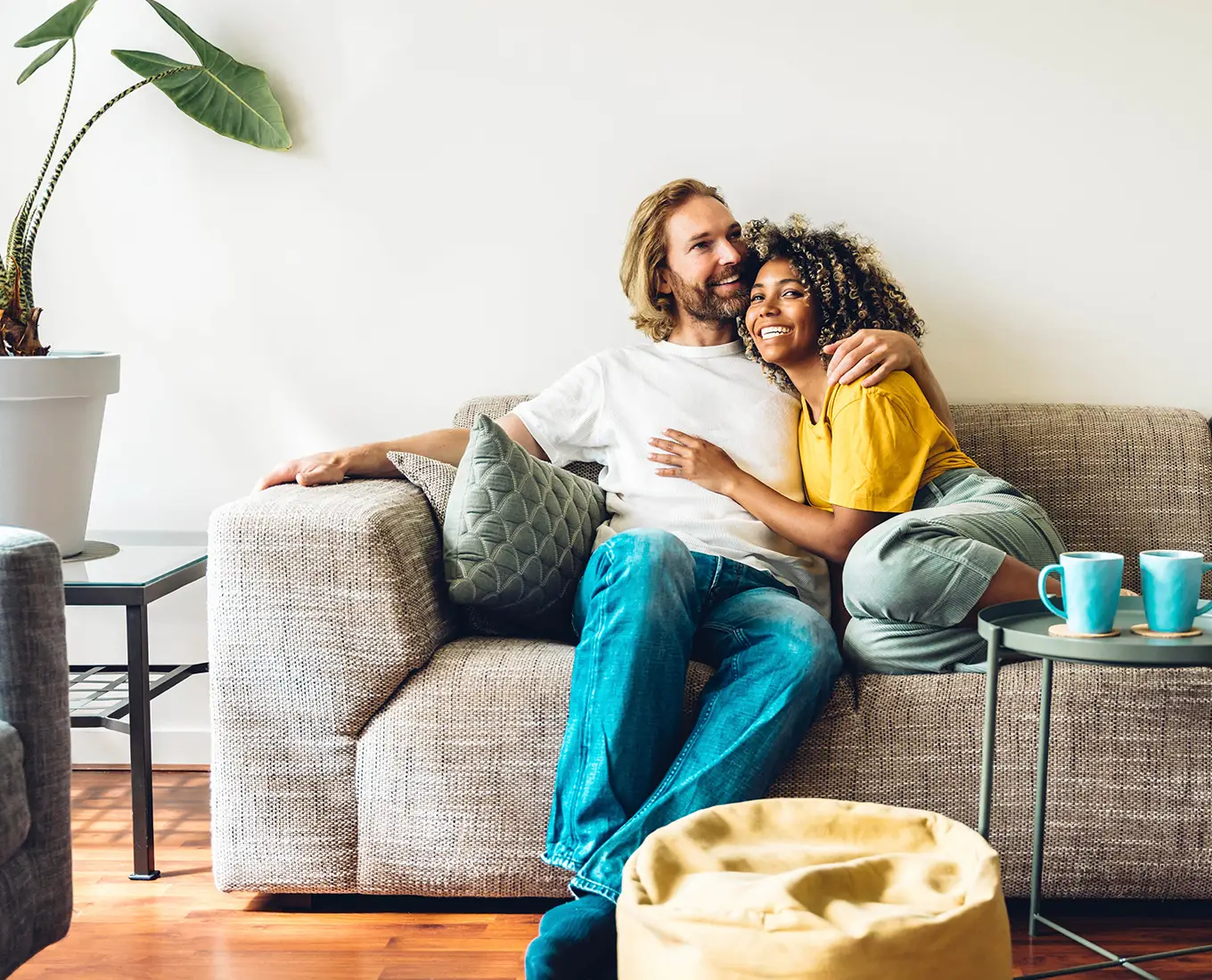 young biracial couple relaxing in home with breathable indoor air quality in Springfield IL