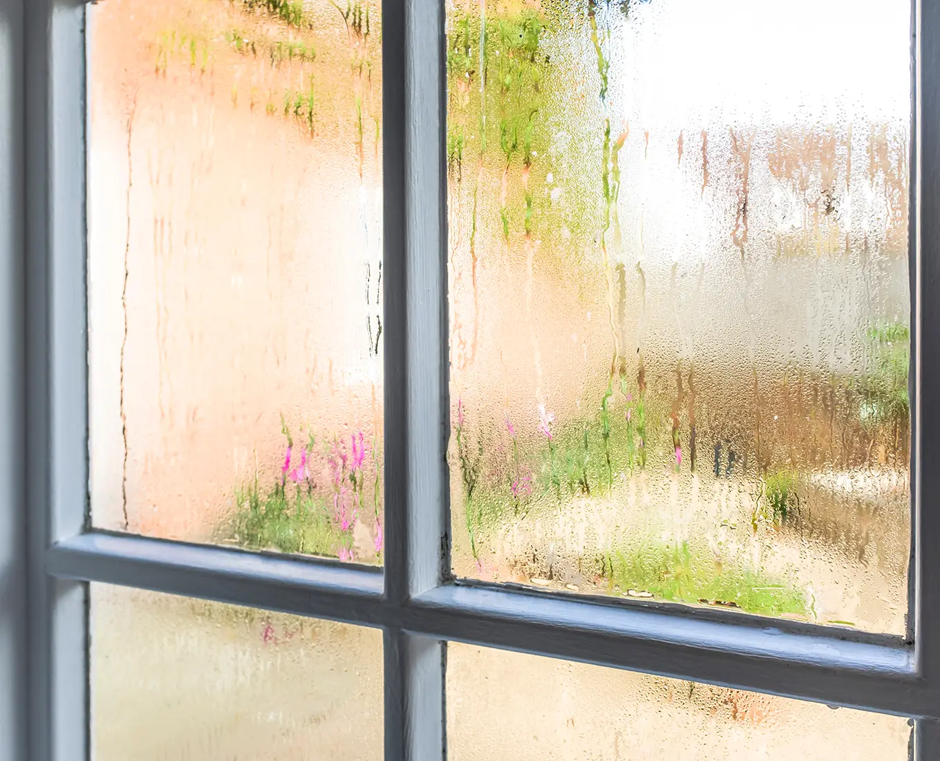 Condensation on window indicating indoor humidity and air quality concerns in Springfield, IL home