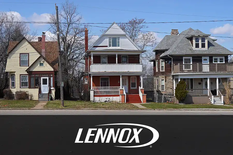 BORMIDA HEATING & COOLING - Three older homes situated side by side on a street in Springfield, IL.